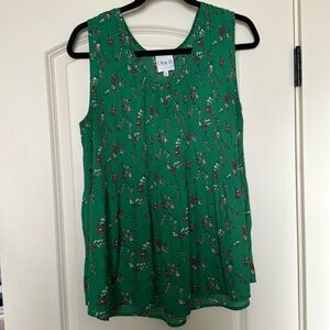 Green blouse with floral pattern